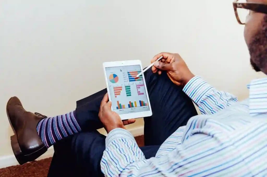 An executive looking at data charts for his college